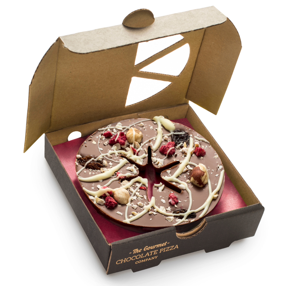 4 Inch Milk Chocolate Pizza with hazelnuts, raisins, raspberries and white chocolate drizzle